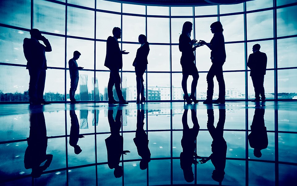 Team Meeting by Glass Wall